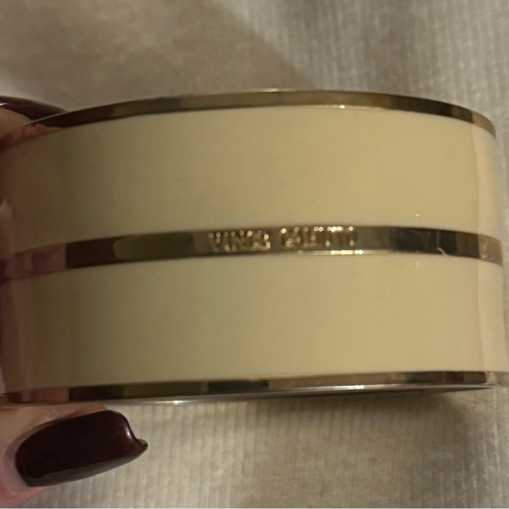 Vince Camuto women’s closed cuff bracelet. Ivory and gold tone. 1-1/4”H 2-1/2”W
